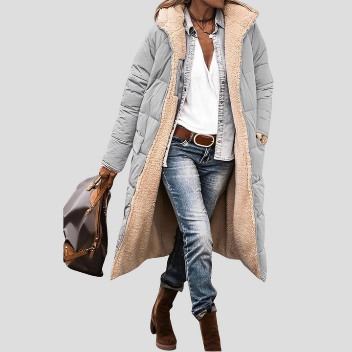 Stylish women's reversible winter jacket, warm & fashionable, ideal for versatile cold-weather outfits.