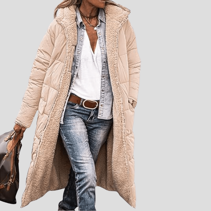 Super cozy women's hooded winter coat, reversible design offers warmth & comfort for cold-weather fashion.