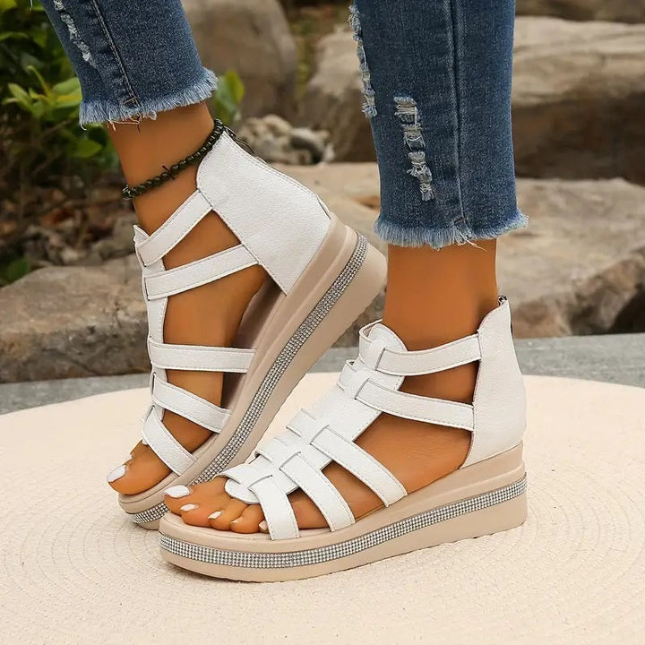 Plush orthopedic sole in women's rhinestone comfort sandals for all-day wear.