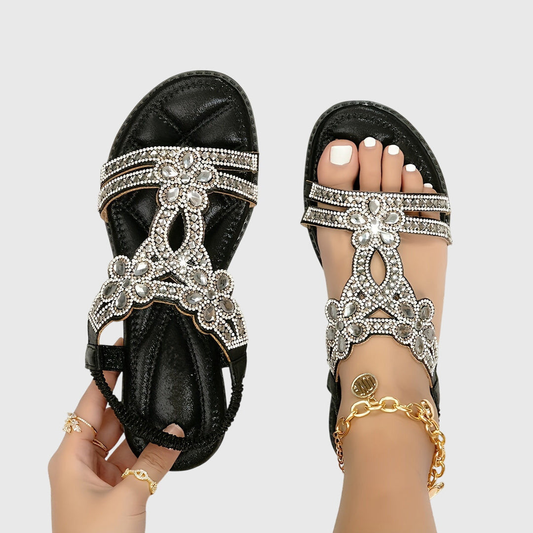 Women's rhinestone flat sandals, perfect for summer resort wear.