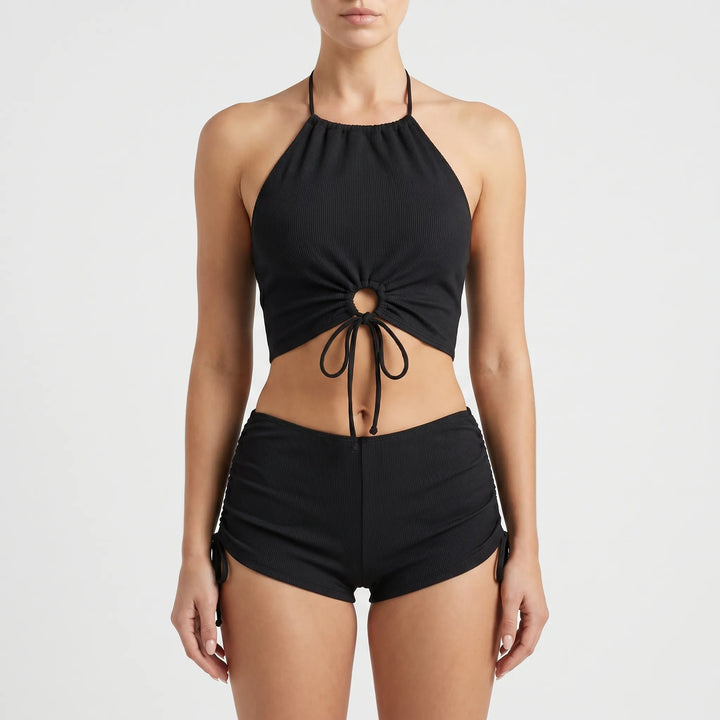 Adjustable halter tankini and boyshorts two-piece swim set for women, perfect for summer beachwear.