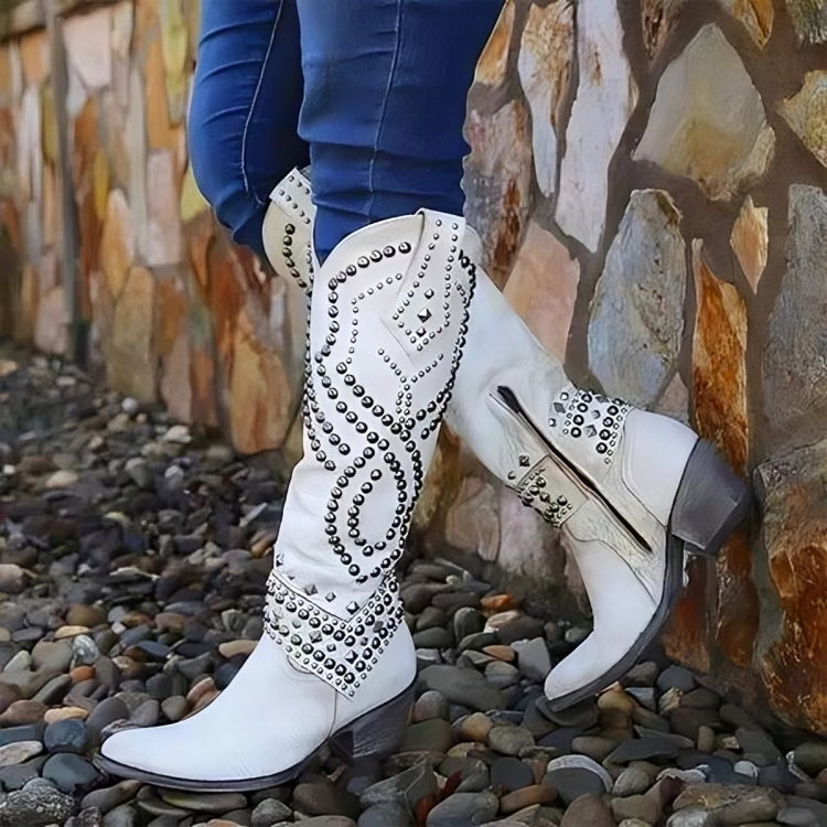Women's Riloh orthopedic knee-high boots featuring mid-block heel, pointed toe & side zipper. Stylish & comfortable.