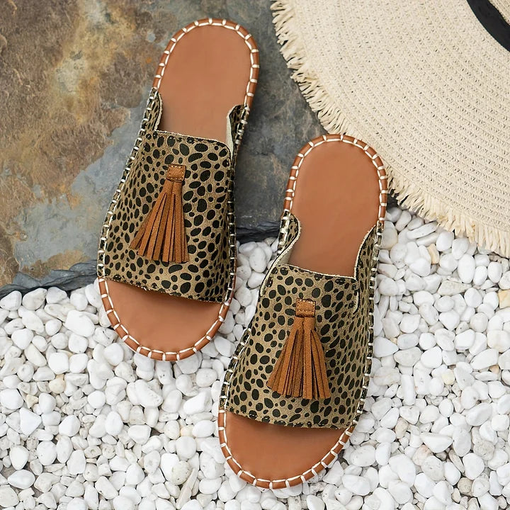 Angled view of women's Robin Comfort Flat Sandals, stylish and comfortable for everyday summer fashion.