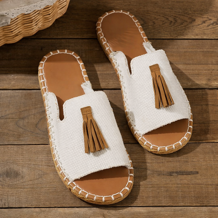 Side view of vibrant women's Robin Comfort Flat Sandals, essential everyday summer footwear.