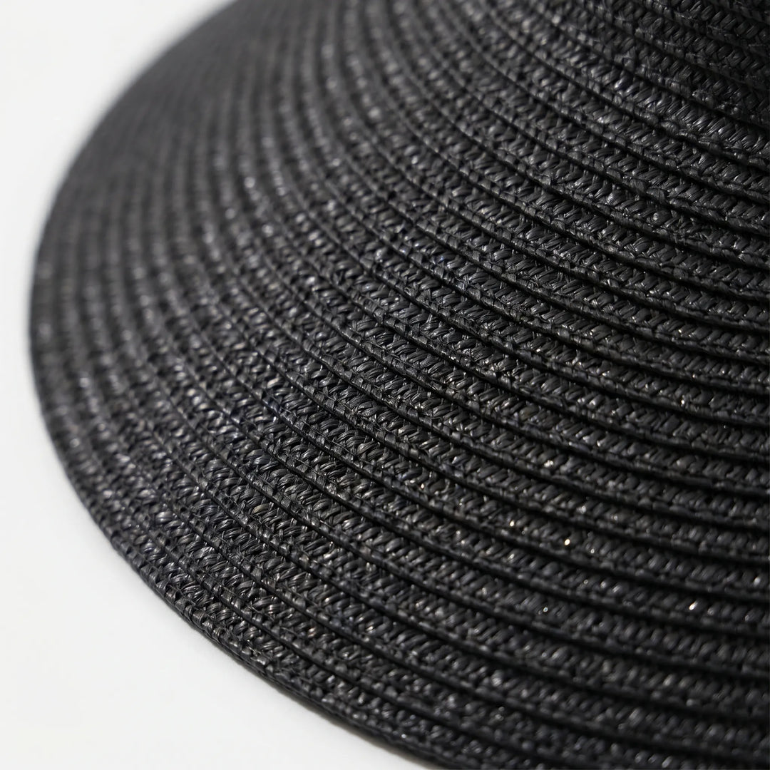 Stylish women's sun visor travel hat. Roll-up design for beach, vacation, and summer outdoor activities.