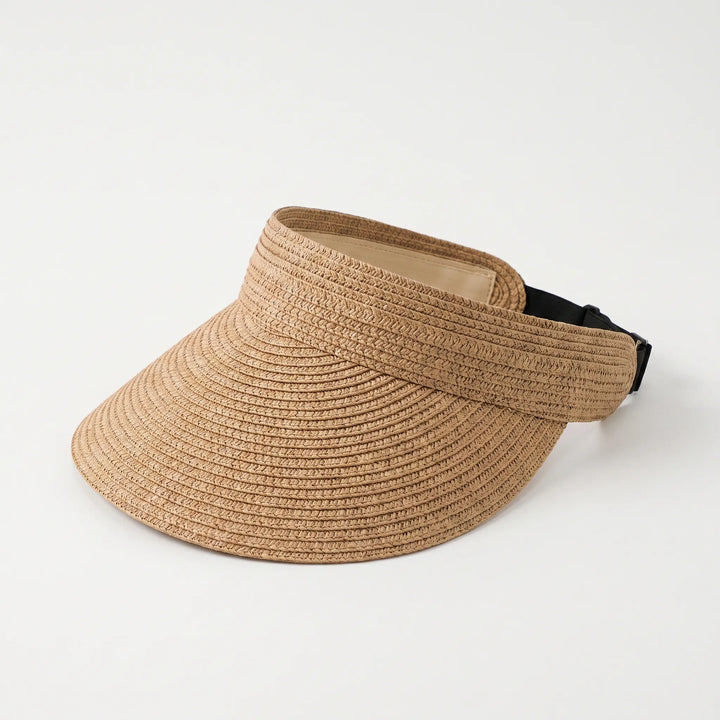 Adjustable women's open top sun visor hat. Roll-up design, great for summer travel, beach, & vacation.