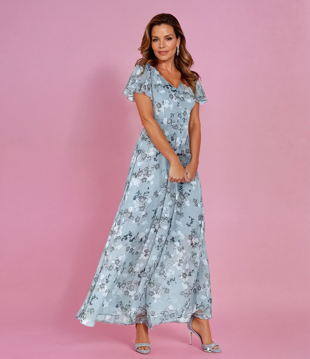 Women's romantic floral maxi dress with elegant flutter sleeves, perfect for summer parties & vacations.