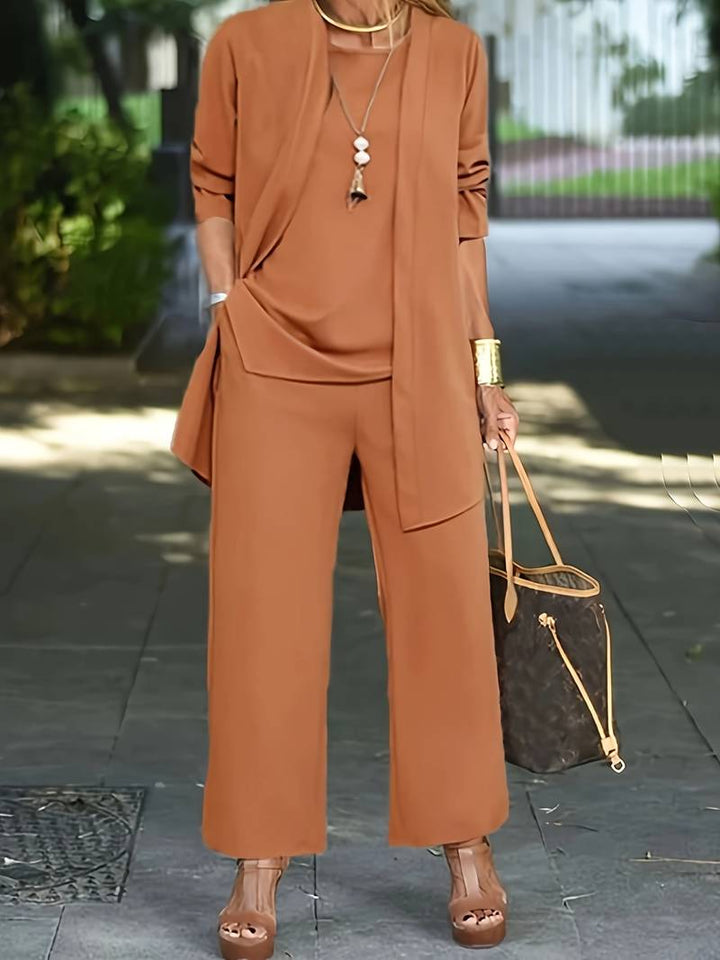 Stylish women's 3-piece long sleeve set with wide-leg pants. Perfect comfortable casual outfit for everyday wear.
