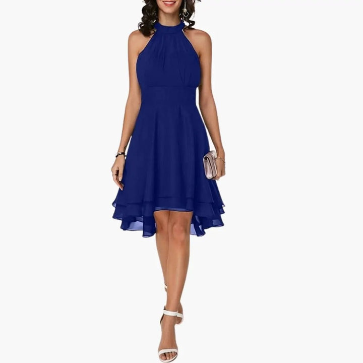 Elegant women's sleeveless ruffle dress with a round neck and straight fit. Perfect versatile summer fashion.