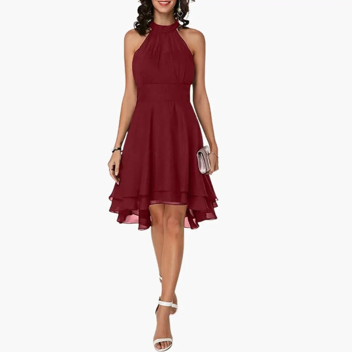 Stylish women's sleeveless ruffle dress in a knee-length, straight fit design with a comfortable round neck.