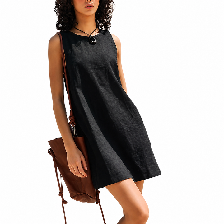 Chic women's sleeveless shift mini dress with a round neck, ideal for versatile summer styling & minimalist looks.
