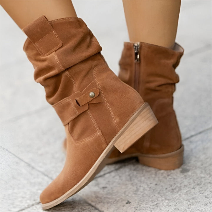 Chic women's ruched ankle boots with easy side zip, cushioned for comfort, ideal for fall & winter.