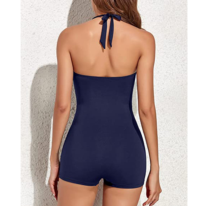 Front view of a women's flattering ruched halter one-piece swimsuit with boyleg cut.