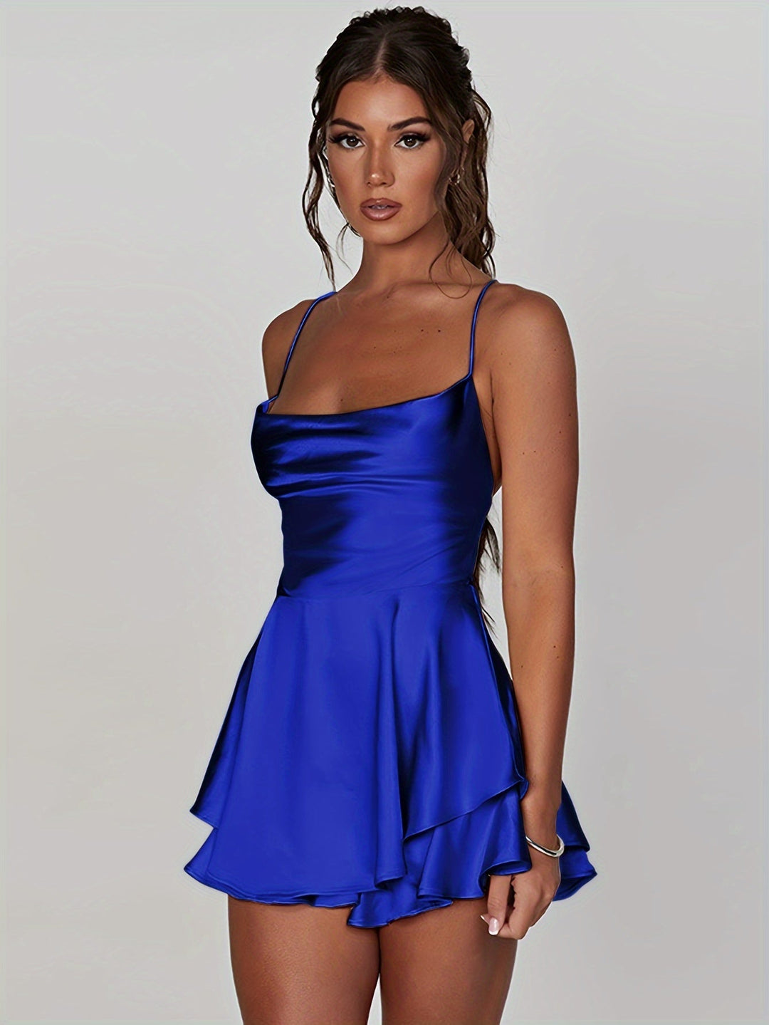 Homecoming mini dress with beautiful ruched bodice and tiered skirt design.