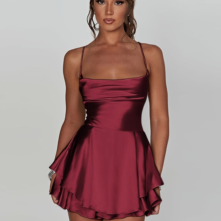 Elegant women's ruched mini dress, tiered for a graceful homecoming look.