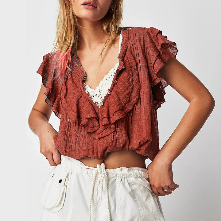 Women's ruffle front crop top, perfect for beachwear & summer vacations.