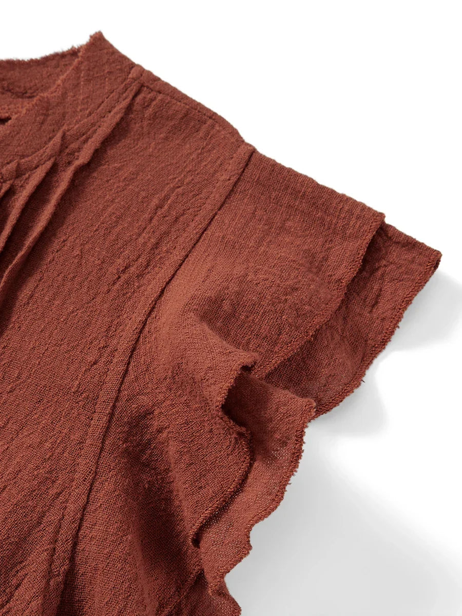Women's vacation crop top, featuring ruffles, flutter sleeves & a relaxed fit.