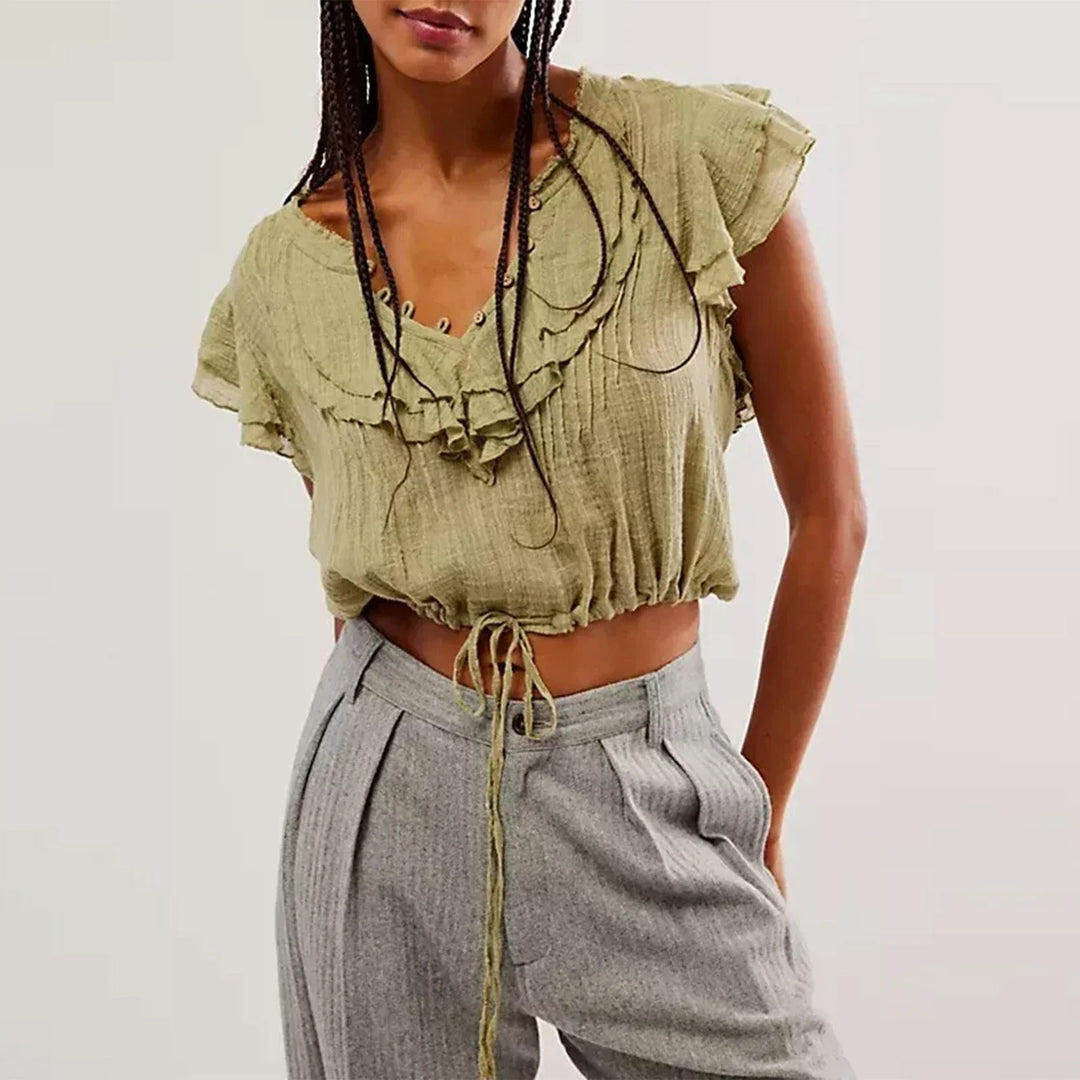 Relaxed fit women's ruffle front crop top, great for beach, vacation, resort wear.