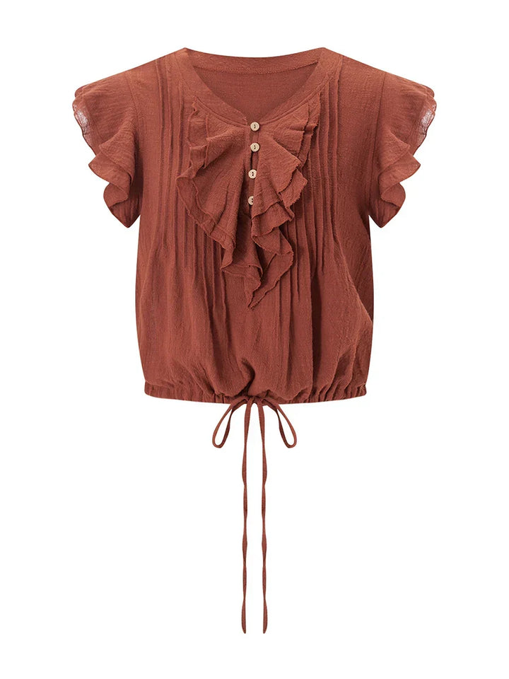 Chic women's flutter sleeve crop top with ruffles, ideal for summer beach style.