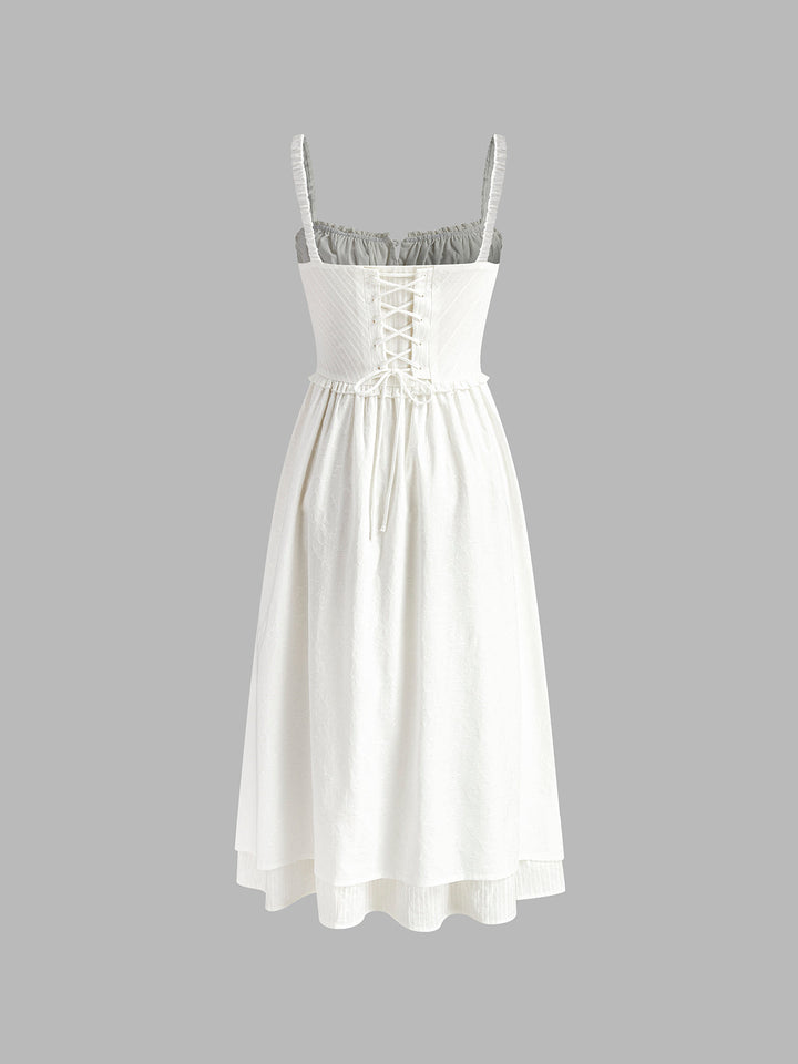 Women's plain sleeveless midi dress with a fashionable ruffle hem, a versatile piece for any wardrobe.