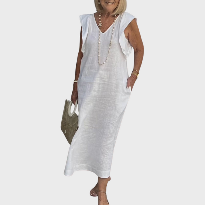 Women's ruffle shoulder V-neck sleeveless maxi dress with practical pockets, ideal for summer fashion.