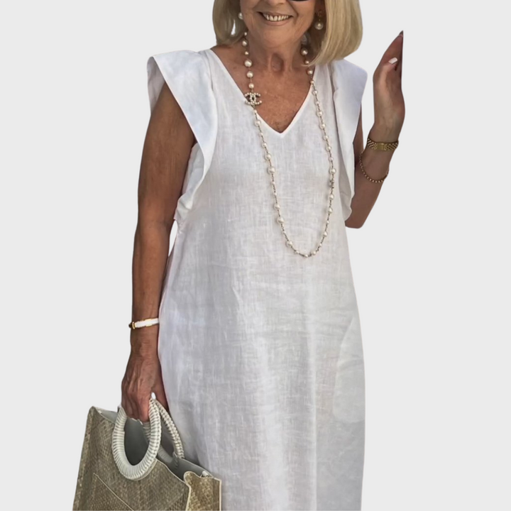 Chic women's sleeveless maxi dress with ruffle shoulders & V-neck, perfect for resort wear or casual elegance.
