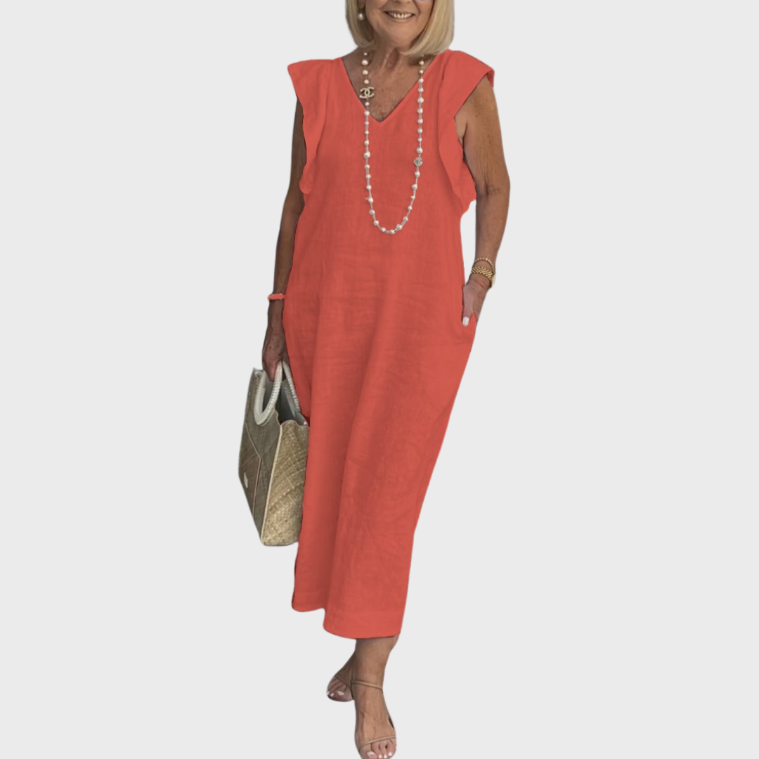 Elegant women's sleeveless V-neck maxi dress, featuring ruffle shoulders & handy pockets, for chic style.