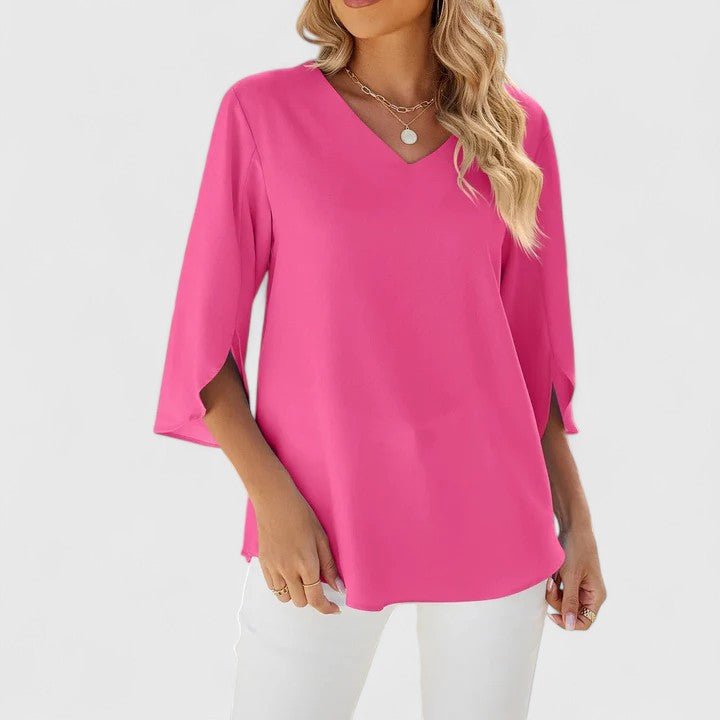 Light & airy women's ruffle V-neck top. Split sleeves make it perfect for summer fashion.