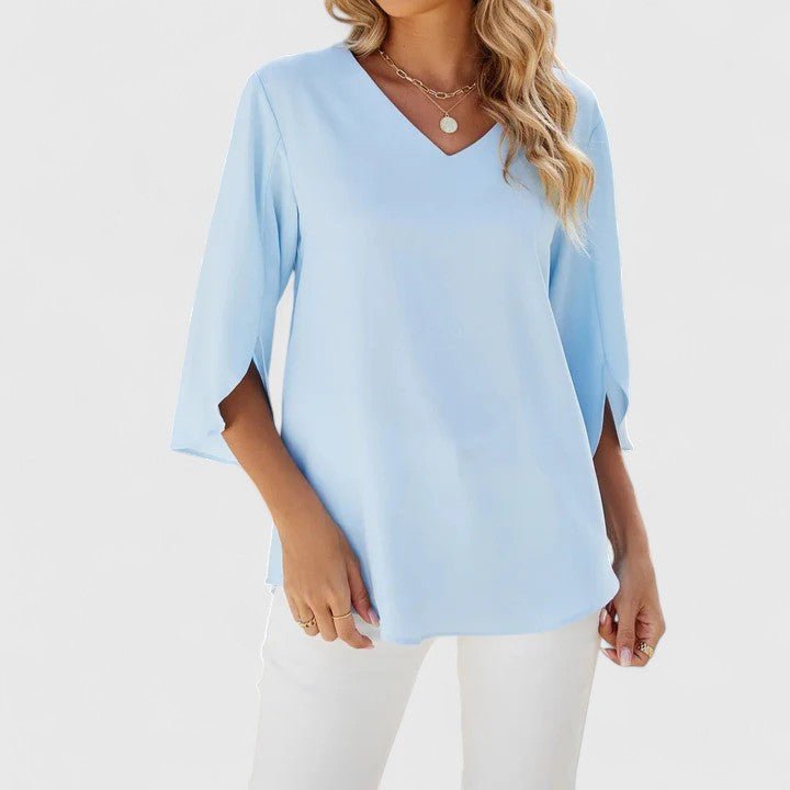 Sophisticated women's V-neck ruffle blouse with stylish split sleeves, excellent for office or casual.