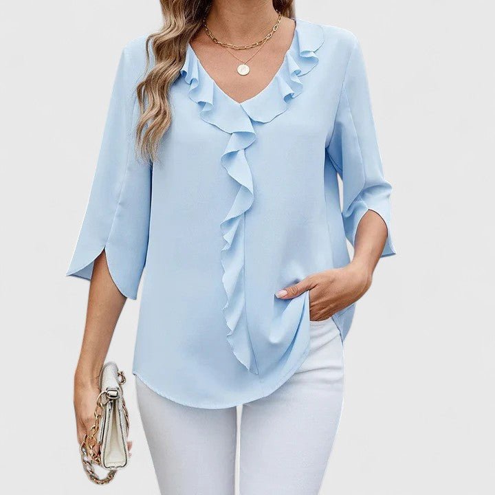Chic women's V-neck blouse featuring delicate ruffles and fashionable split sleeves.