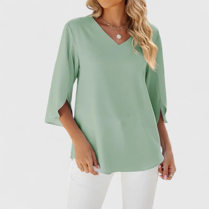 Casual chic women's ruffle V-neck top. Versatile split sleeve blouse for daily or work.