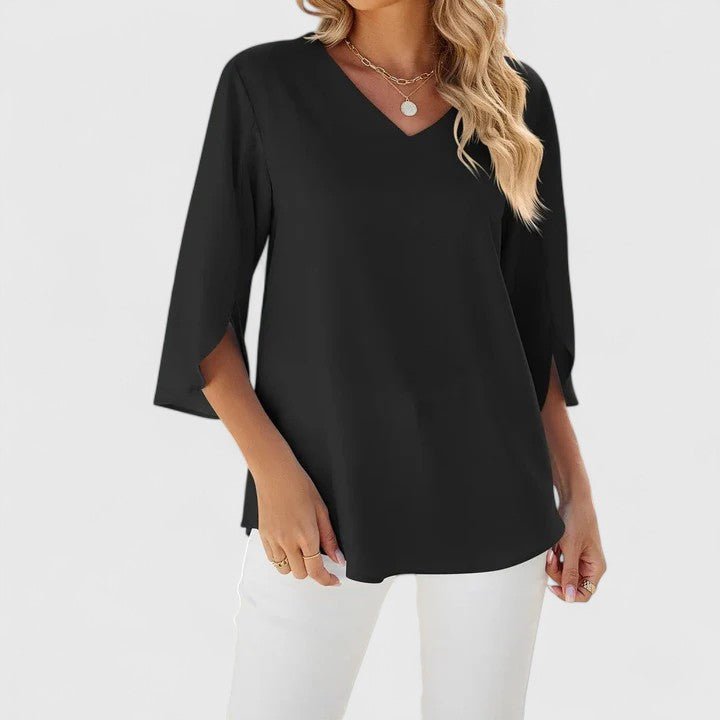 Women's elegant ruffle V-neck top. Split sleeve blouse for stylish spring and summer fashion.