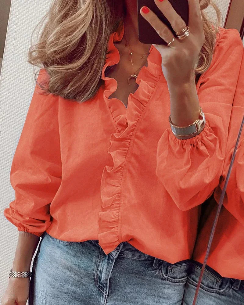 Women's ruffle V-neck long sleeve blouse, elegant & relaxed fit, perfect for office or casual wear.