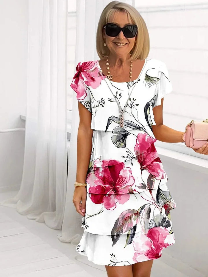 Women's Ruffled Floral Pleated Midi Dress, elegant & flowy, perfect for summer parties & special occasions.