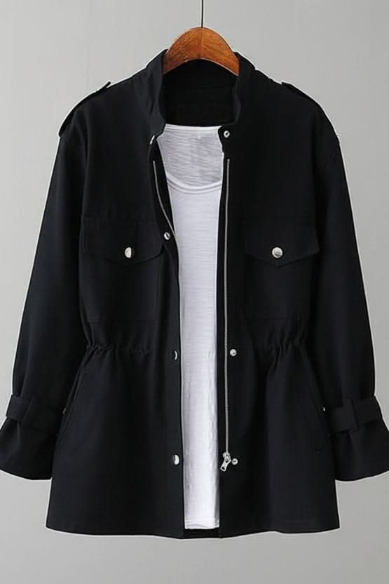 Rugged women's utility jacket with fashionable open back, great for casual wear, street style, and layering.
