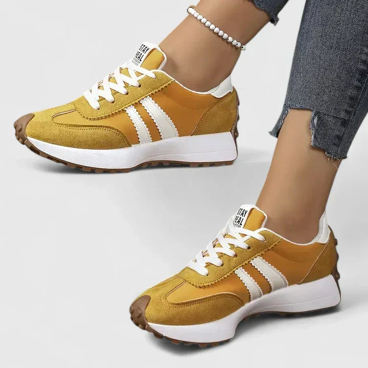 Lace-up women's athletic trainers with chunky sole, perfect for running, gym workouts & sporty activities.