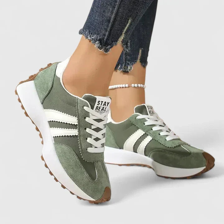 Performance women's running shoes with supportive chunky sole. Stylish athletic trainers for sport & fitness.