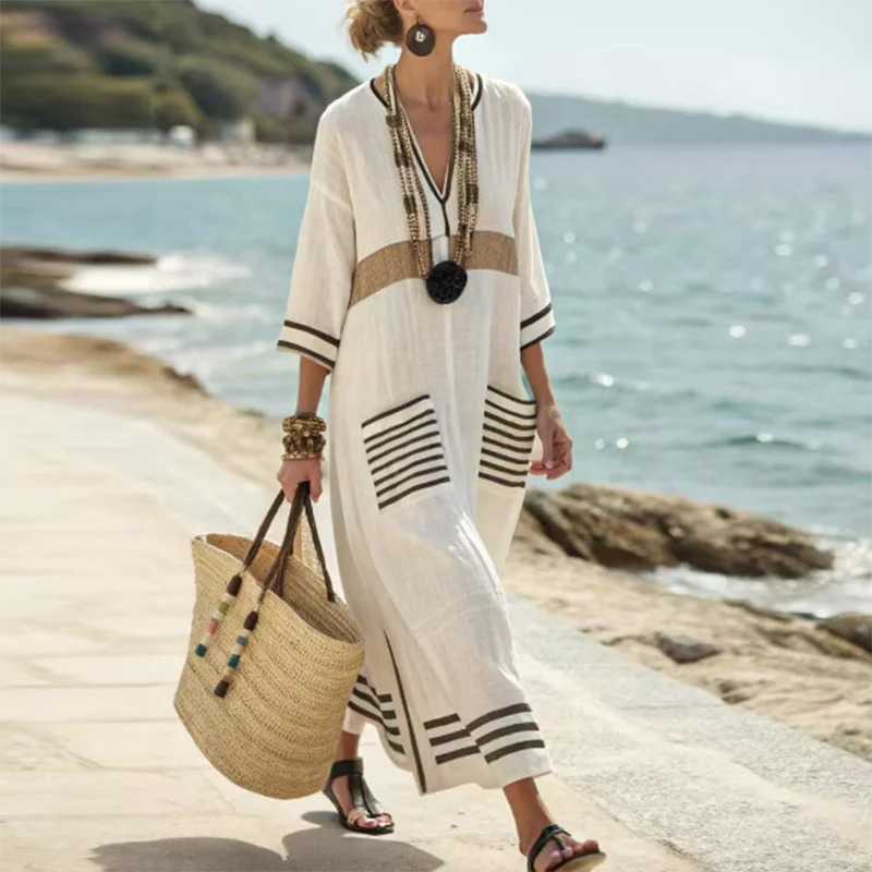 Stylish Santorini striped kaftan maxi dress, a versatile women's summer outfit for casual wear, beach, or resort.