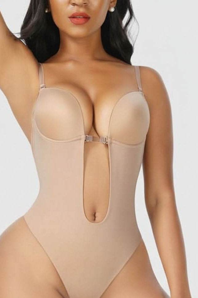 Nude seamless backless bodysuit for women, offering slimming support and a sleek silhouette.