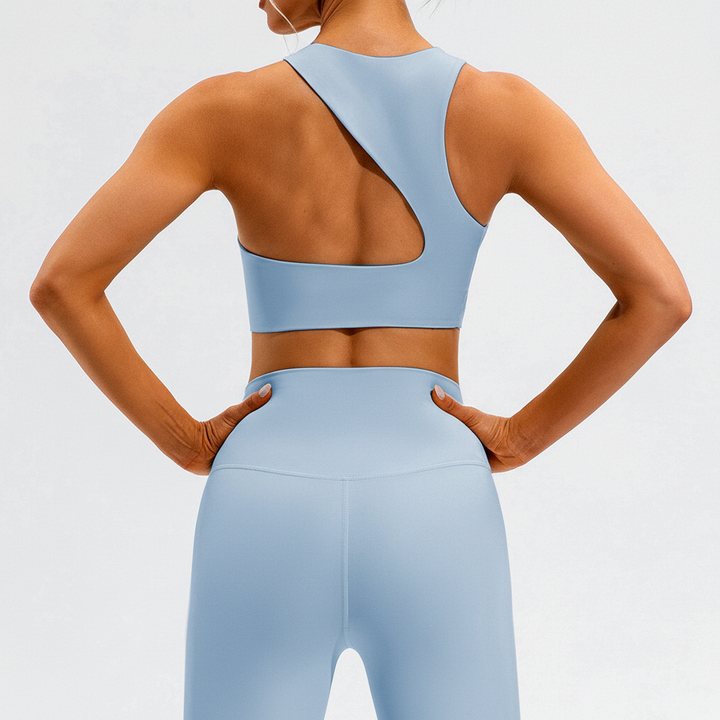 Female seamless workout set, Ainsley top & high-waisted leggings. Perfect for athletic training.