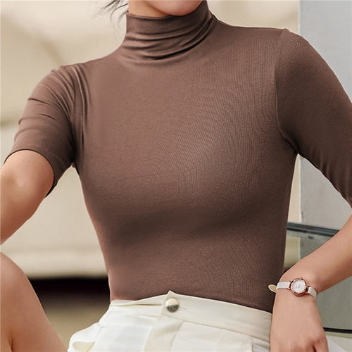Modern women's seamless slim fit turtleneck. Comfortable long sleeve top, ideal for versatile fall & winter outfits.