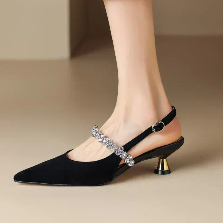 Classic women's pointed toe slingback heels with luxurious crystal straps, perfect for formal occasions.