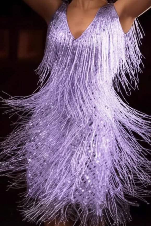 Glamorous women's A-line shimmer fringe party dress, a stylish sequin evening gown for special occasions.