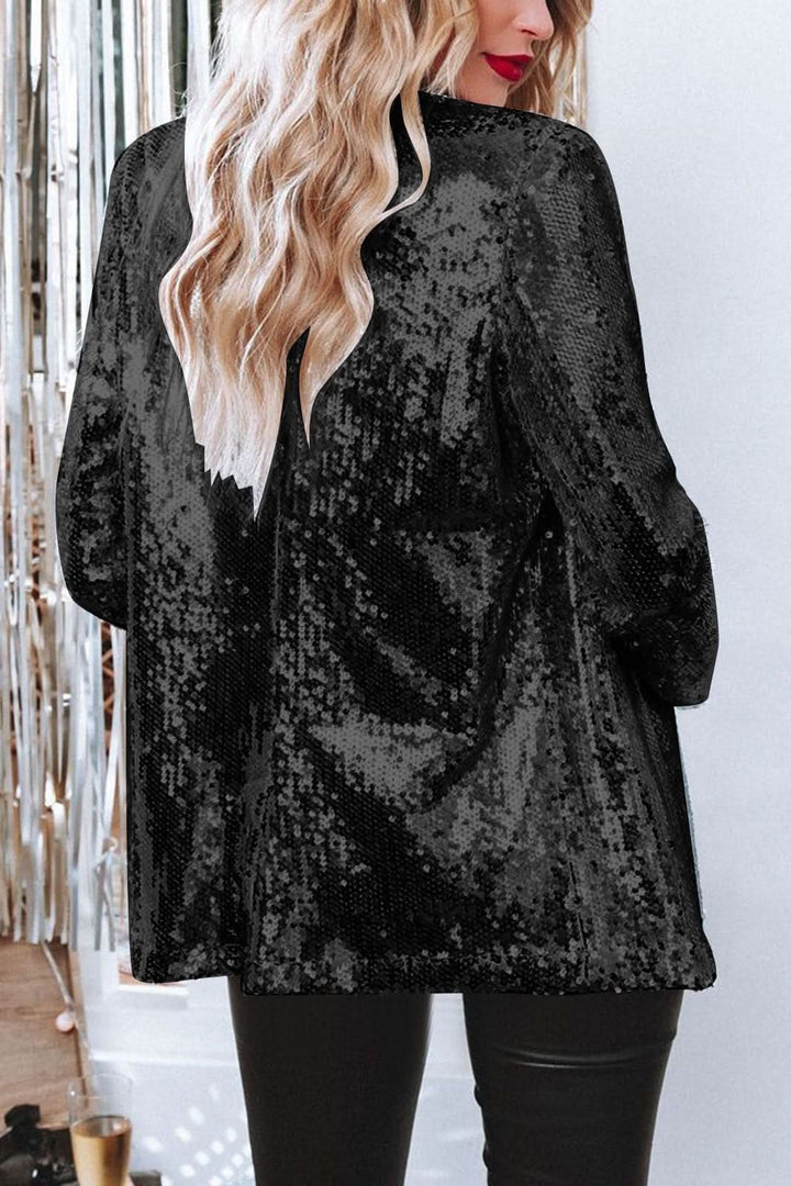 Glamorous women's sequin blazer with a tailored fit, ideal for a night out.