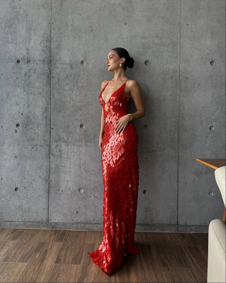 Stunning red sequin maxi dress with a deep plunge neckline. Perfect sparkly party dress for formal events.