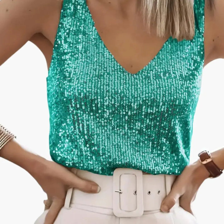 Chic women's sequin tank top, shimmering and round neck, suitable for glamorous event wear.