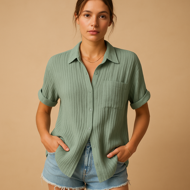 Versatile women's short sleeve pocket shirt, a comfortable casual top with button-down front, great for layering.
