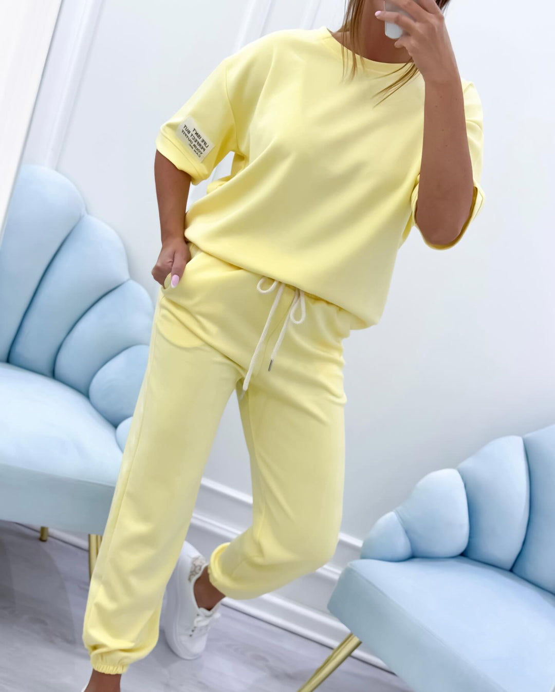 Stylish women's short sleeve matching set. Versatile lounge outfit for relaxed, comfortable wear.
