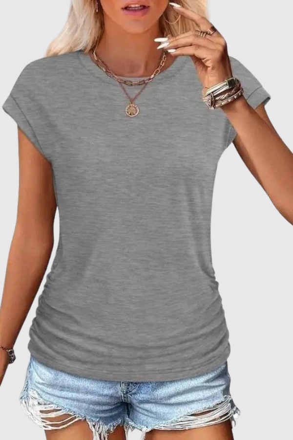 Women's short sleeve ruched side tunic top for effortless comfort and style. Perfect for casual summer wear.