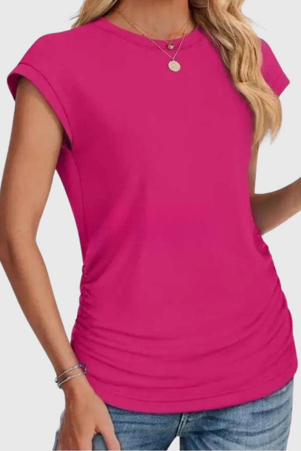 Effortlessly stylish women's short sleeve ruched side tunic. A comfortable, versatile blouse for summer and casual wear.